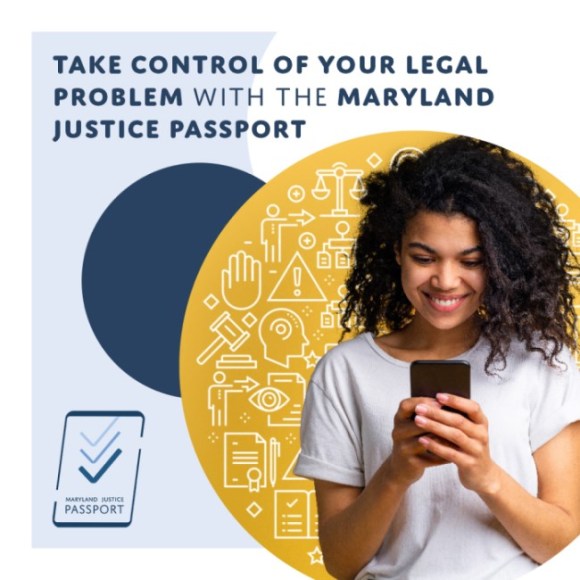 Woman looking down at her phone and grinning