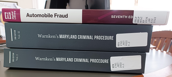 Spines of NCLC Automobile Fraud and Warnken's Maryland Criminal Procedure volumes 1 and 2